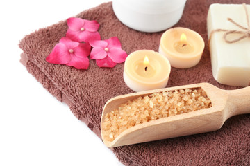 Composition with spa cosmetic, candles and hortensia flowers, isolated on white