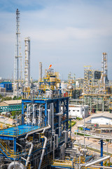 Fototapeta premium Oil and chemical refinery plant with cloudy sky