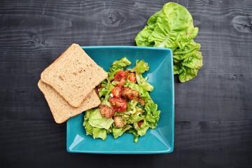 Fresh vegetable salad, healthy food, tomatoes and salad leaves. Healthy chicken salad with fresh...