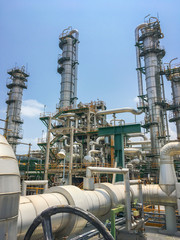 The equipment of oil refining in process area ,Close up of industrial pipelines of an oil refinery...