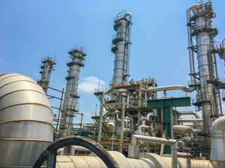 The equipment of oil refining in process area ,Close up of industrial pipelines of an oil refinery...