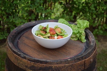 Fresh vegetable salad, healthy food, tomatoes and salad leaves. Healthy chicken salad with fresh vegetables