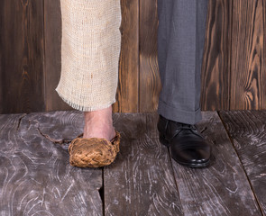 concept of rich and poor in a person,New shoe and old shoe