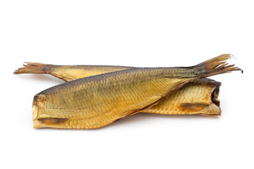 Smoked trout in front of a white background.