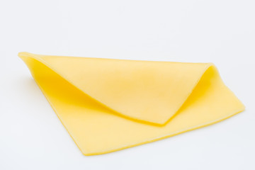 Cheese slices on white background cutout.