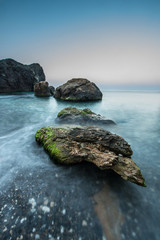Stones in the sea on a long exposure