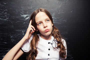 Girl near blackboard