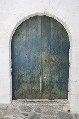 Fototapeta na wymiar Blue old wooden door in Formentera