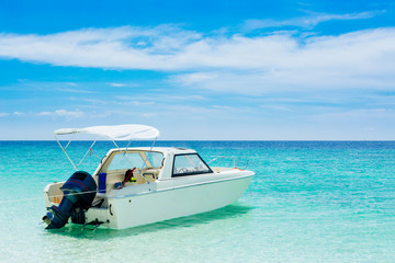 Obraz na płótnie Canvas Motor boat on the beach