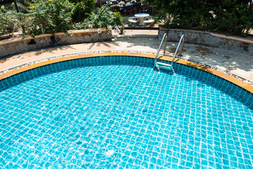 Swimming pool with stair at hotel