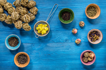herbal and green tea for tea-house blue wooden desk background flat lay mockup