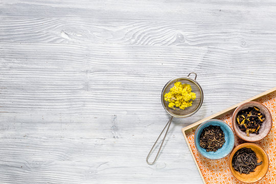 Fototapeta Drink herbal tea with brew gray wooden table background top view space for text