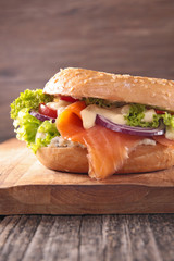 burger with smoked salmon and vegetable