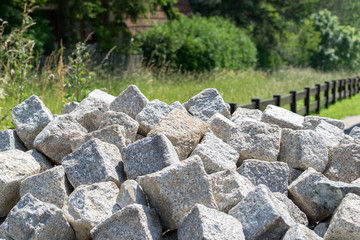 Fototapeta na wymiar A bunch of stone blocks ready for reconstruction