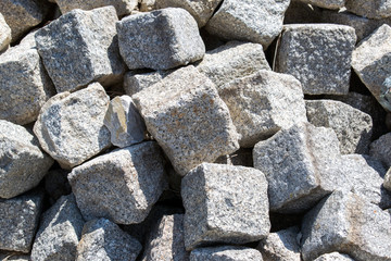 A bunch of stone blocks ready for reconstruction