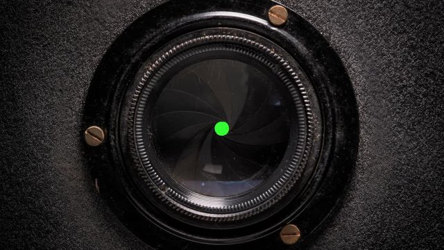 Vintage Lens shutter with chroma green background.