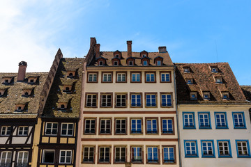 Detail of a building in the city centre of Strasbourg against blue sky