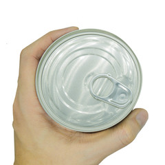 top view of hand hold the cover Aluminum canned food on white background.
