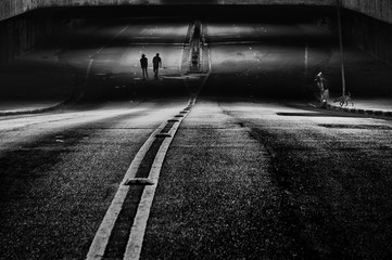 silhouette couple walking on the street