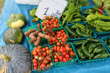 containers of jalapenos and tomatoes