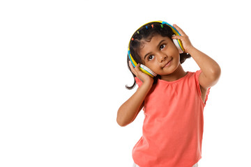 Music and technology concept.Child with headphones.Isolated