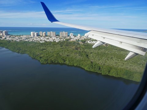 Fototapeta Beautiful aerial view of the tip of San Juan District, seen from an airplane window.