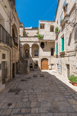 Fototapeta na wymiar Polignano a Mare (Puglia, Italy) - The famous sea town in province of Bari, southern Italy. The village rises on rocky spur over the Adriatic Sea, and is known tourist attraction.
