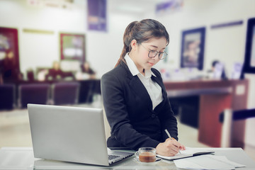 Business, people and concept - business woman Copy report account on the office desk.