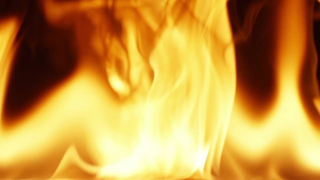 Hot fire flames in super close up position filmed in slow motion