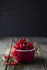 Fresh red currants in bowl