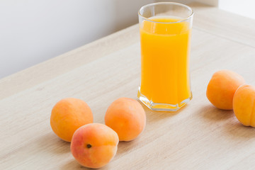 peach juice on wooden table