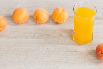 peach juice on wooden table