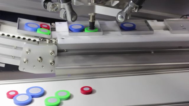 Robotic arm pick and place automation;process of picking parts up and placing them in new location;increase productivity;convener line ;industrial manufacturing equipment background