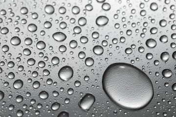 Water drops on silver surface