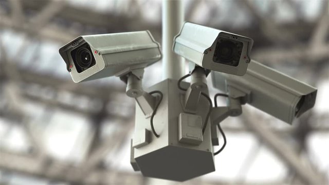 Security cameras scanning the street in 4K