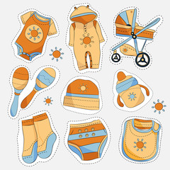 Set of sticker style baby items on light background