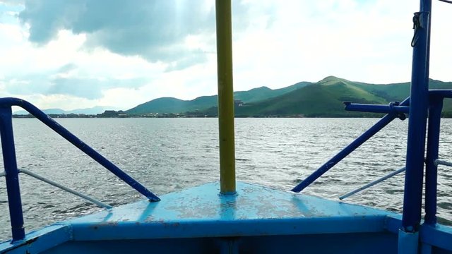 View from the old ship floating along a lake