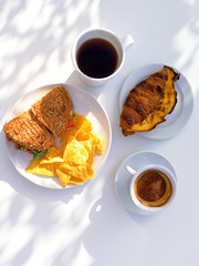 Sandwich and croissant cheese and lettuce