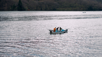 Fototapeta na wymiar Fisherman on Lake Ashi in Hakone, Ashigarashimo District, Kanagawa Prefecture, Japan