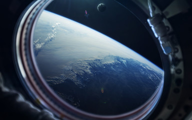 Science fiction space wallpaper, blue earth from space station window. Elements of this image furnished by NASA