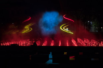 Fototapeta na wymiar Water Fountain In Night, Laser show