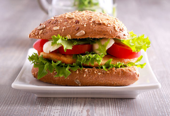 Chicken fillet, tomato and mozzarella sandwich