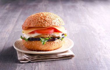 Homemade hamburger with chicken, eggplant, tomato