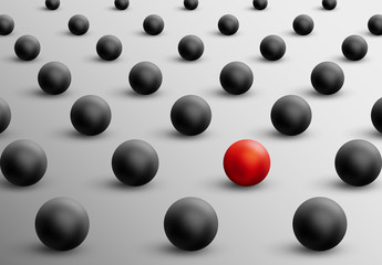 Unique red ball among black ones