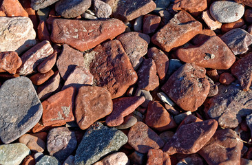 stones piled up close view hard dry uneven