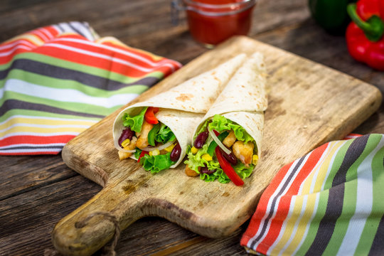 Meat and vegetables wrapped in a tortilla