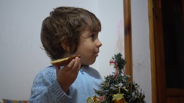 4K Child Eats Bread And Butter On Christmas Eve