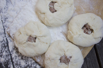 a pie with meat and onions