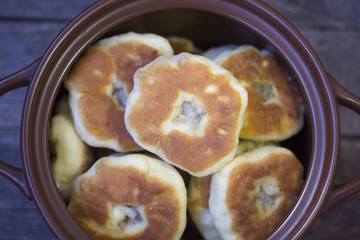 a pie with meat and onions