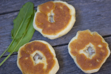a pie with meat and onions